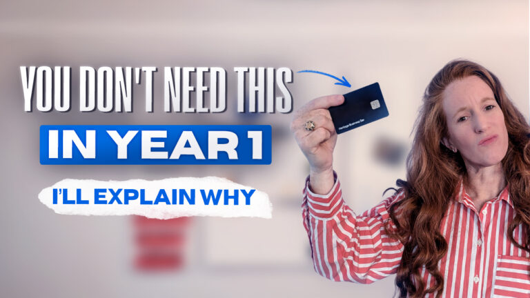 You Don't Need This In Year 1. I Explain Why. Image of red headed woman holding a credit card.